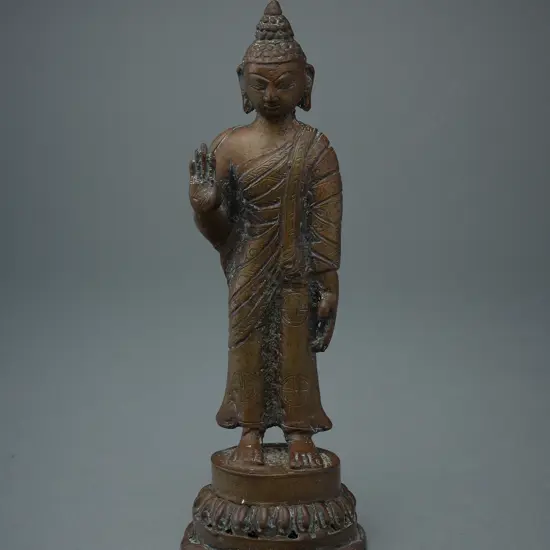 Tibetan brass standing Buddha figure,